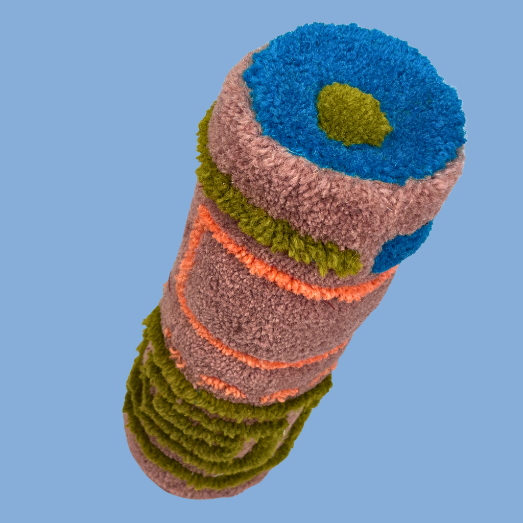 Dusty Rave cylinder doorstop - top view showing cobalt blue ring with olive green centre