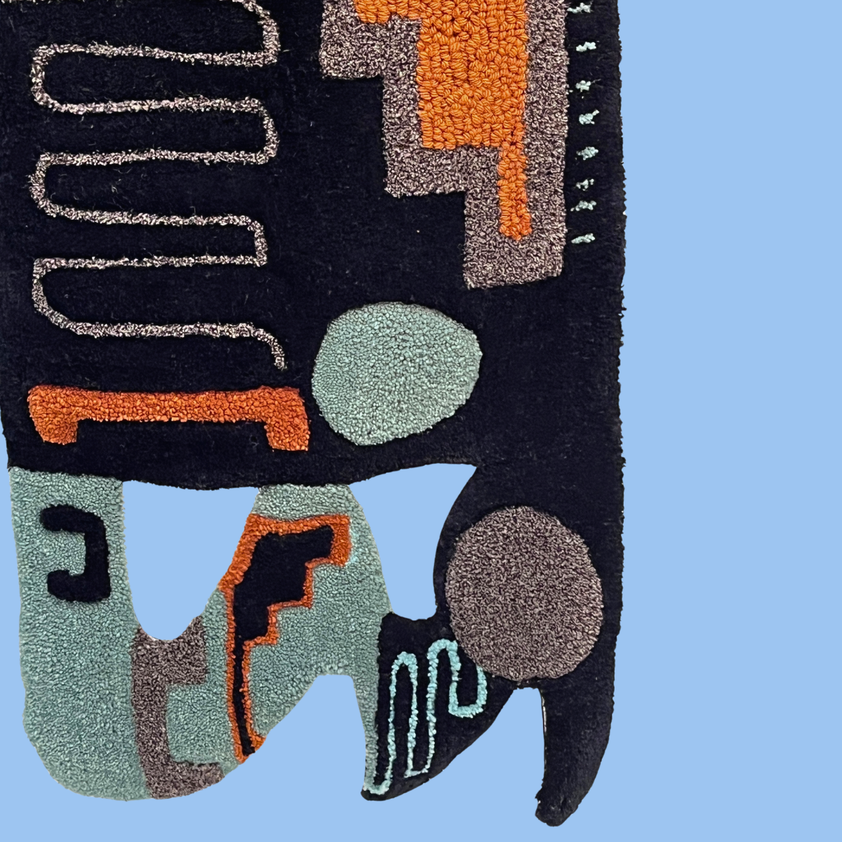 Circuit Rug — close-up of maze-like spiral and nested square detail in stone grey