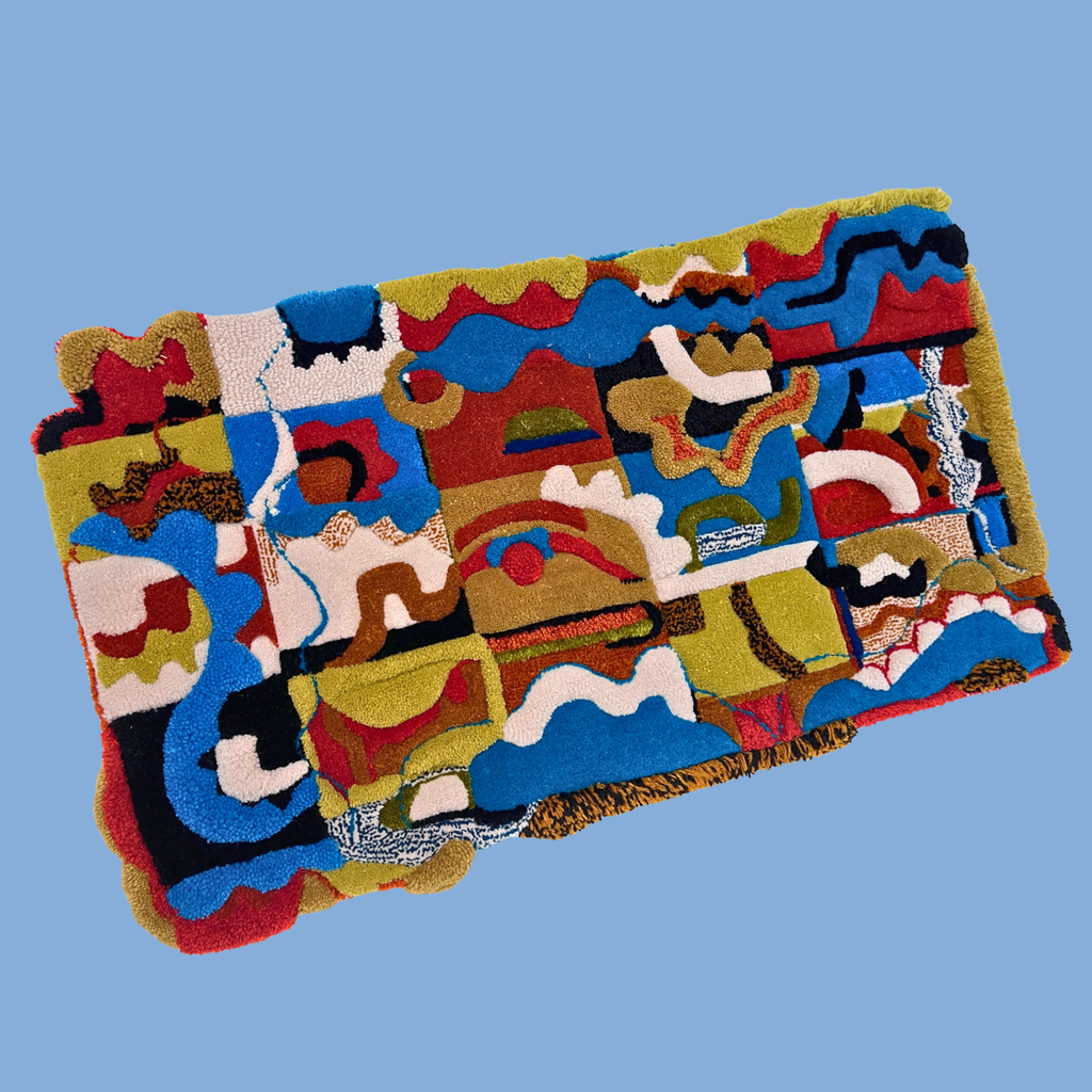 Shifting Grounds rug — full view on blue background